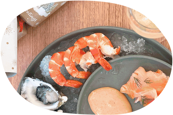 Top view of a plate of cooked prawns